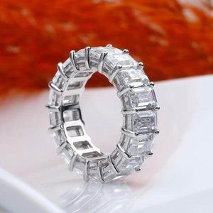 White Sapphire Emerald Cut Wedding Band